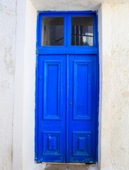 Old wooden door in a Greek village