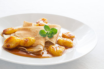 crepes with plums and honey