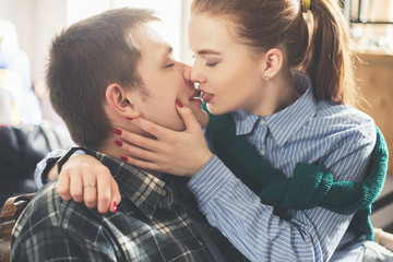 Kissing Happy emotional couple portrait indoors