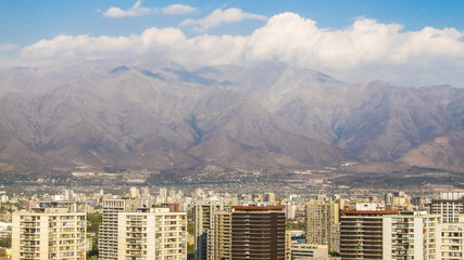 Obraz premium Santiago's skyline with Andes mountains in the background