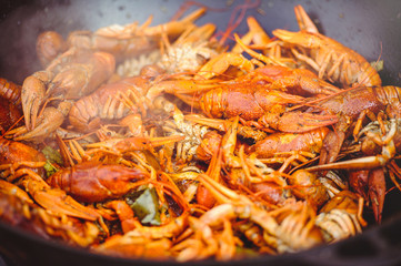 crayfish are boiled in cauldron is steam