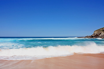 Fototapeta na wymiar Beautiful wave on the beach in Spain