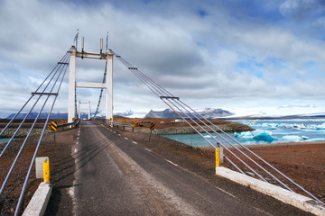 Bridge over a channel connecting Jokulsarlon Lagoon and Atlantic Ocean in southern Iceland.