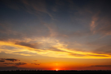 Fototapeta na wymiar Fantastic sunset in the mountains cumulus clouds.