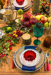 Served table. Beautifully decorated dishes. Christmas background.