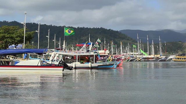 Brazilian boats docks and anchored by town