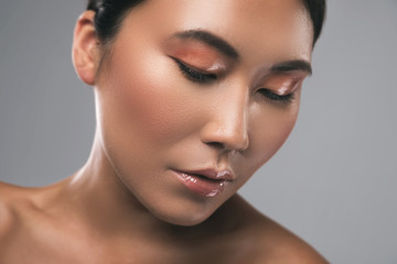 Asian woman with wet eyeshadows