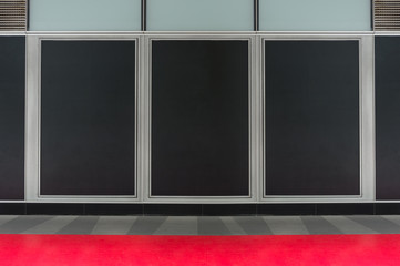 Fototapeta premium Large blank billboard on a street wall, banners with room to add your own text