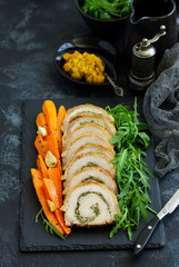 Fried pork loin stuffed with herbs and cheese.