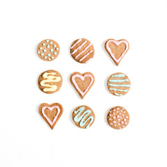 Colorful hand made cookies on white background. Flat lay, top view.