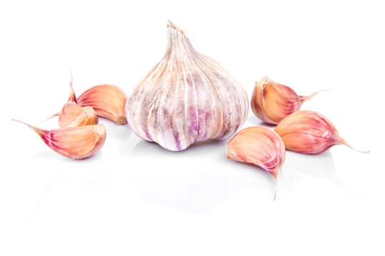 Garlic isolated on white background with reflection.