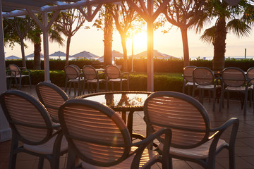 Summer restaurant on the Mediterranean coast on a beautiful sunset. Tekirova-Kemer.