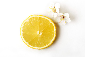 slice ripe lemon citrus fruit on a white background