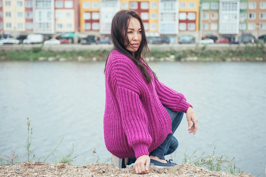 Violet knit cardigan on the girl with long hair