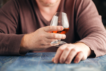 Man relax with alcohol after hard work
