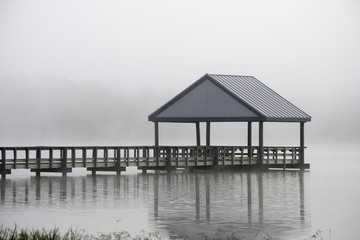 Fog over lake pavilion