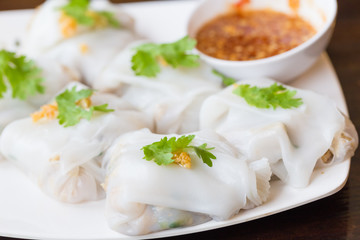Rice noodle roll.vietnamese food, whit sauce in white plate