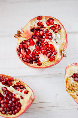 Top view of pomegranate fruit divided on halves.