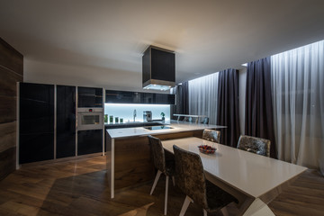 Dining room and kitchen in luxury apartment