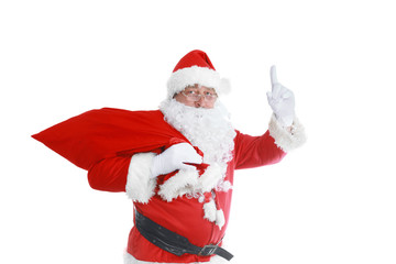 Real Santa Claus carrying big bag full of gifts, isolated on white background