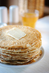 Hip of thin russian pancakes, called blini, at restaurant.