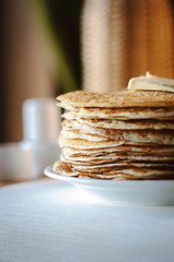 Stack or pile of pancakes at russian restaurant.