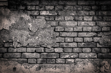 Big B&W wall of old cracked brick background