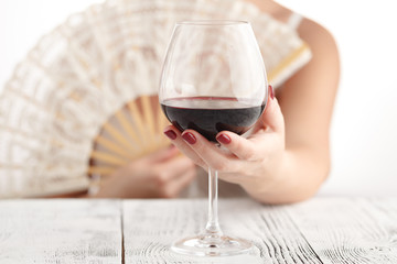 Woman in lingery drink red wine, alcohol for relax