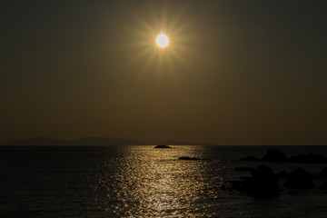 Glazing midday sun over mediterranean sea