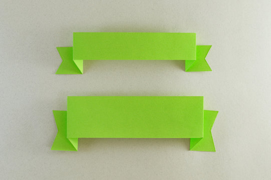 two strips of green paper