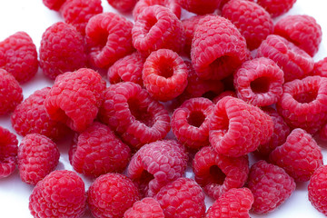 Raspberries in a white background