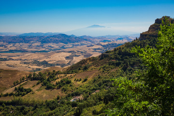Fototapeta na wymiar Enna (Sicily, Italy) - From the Enna Belvedere the view extends from Calascibetta, the northern sector of central Sicily, up to the peaks of the Nebrodi and Etna volcano