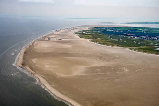 Panorama flight over the Elbe River and the west coast of Germany, with the Kiel-Canal and the Cities of Buesum and St. Peter-Ording