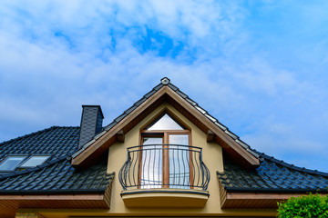 Balcony and roof with tiles of single family house