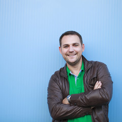 Young man in a brown leather jacket