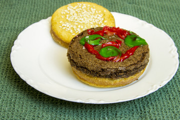 Dessert impostor hamburger on white china plate