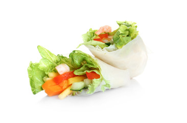 Fresh spring roll in rice paper with shrimps and vegetables on white background