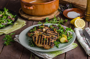 Grilled pork chops with lettuce salad