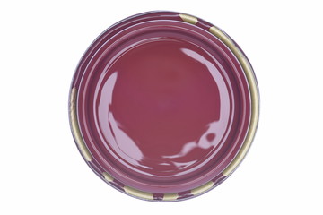 Decorative cherry red paint can lid isolated on white background, top view