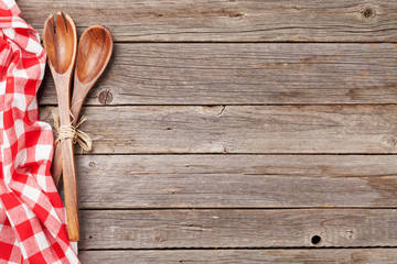 Kitchen towel and utensils on table