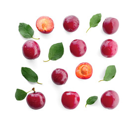 Ripe fresh plums on white background