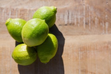 Fresh lemons on wooden table