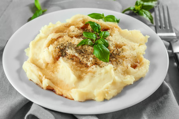 Plate with mashed potatoes on cloth