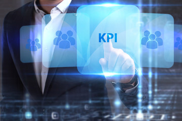 The concept of business, technology, the Internet and the network. The young entrepreneur has found what he needs: KPI