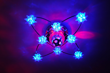 Obraz na płótnie Canvas Overflowing LED chandelier