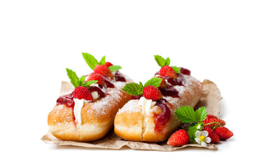 Custard  filled doughnuts with wild strawberry isolated on white