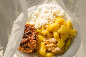 breaded chicken with potato and 