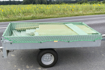 trailer with net for load securing