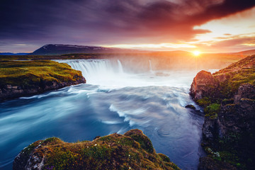 The rapid flow of water powerful Godafoss cascade. Location place Skjalfandafljot river, Iceland,...