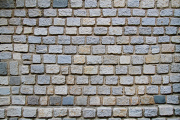 Stacked stone wall as background, texture